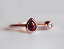 Pear Ruby Engagement Ring with Round Aquamarine Side Gemstone