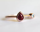 Pear Ruby Engagement Ring with Round Aquamarine Side Gemstone