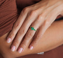 Oval Emerald Cluster Ring with 2 Horizontal Placed Pear Emeralds and Emeralds on the Band