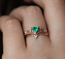 Close-up of Emerald Ring Set, featuring genuine emerald, diamond accents, vintage design.