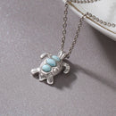 Pendentif tortue avec pierre larimar