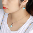 Boucle d'oreille pendante larimar des caraibe