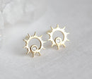 Round white diamond inside sun-shaped gold stud earrings