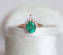 Oval Emerald Ring with 1.2ct oval cut natural Emerald and Diamonds.