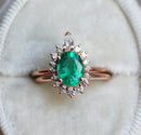 Oval Emerald Ring with Diamonds in jewelry box, showcasing 1.2ct Emerald & Diamonds.