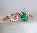 Close-up of Oval Emerald Ring with oval cut natural Emerald and Diamonds.