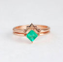 Elegantprincess cut emerald ring set showcasing its detailed design.