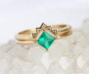 Stylish princess cut emerald ring set featuring a timeless look.