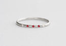 Round Ruby Ring with Side White Diamonds
