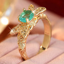 Bague dorée pierre verte