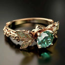 Bague dorée pierre verte