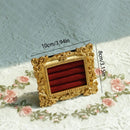 Presentoir bague maison