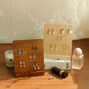 Cadre porte boucle d'oreille