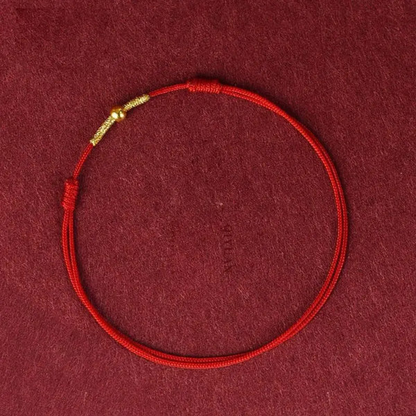 Bracelet cordon rouge