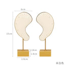 Porte boucle d'oreille professionnel