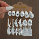 Grosses boucles d'oreilles dorées (18 pièces)