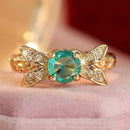 Bague dorée pierre verte