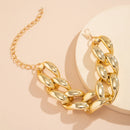 Gros collier doré femme