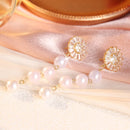 Boucle d'oreille pendante perle