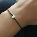 Bracelet en fil rouge