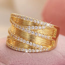 Bague large dorée zirconium