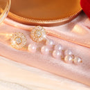 Boucle d'oreille pendante perle