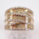 Bague large dorée zirconium