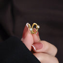 Puces d'oreilles dorée