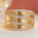 Bague large dorée zirconium