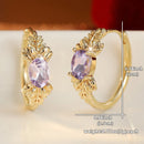 Boucles oreilles dorées violettes