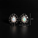 Boucle d'oreille opale noire femme