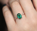 Elegant oval emerald ring with a classic and timeless design.