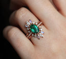 Elegant oval emerald ring featuring a modern and elegant look.
