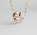 Solid gold necklace with three marquise-cut white diamonds