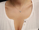 Solid gold necklace with three marquise-cut white diamonds
