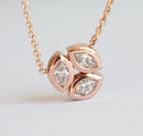 Solid gold necklace with three marquise-cut white diamonds