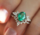 Oval Emerald Ring Set featuring oval-cut Emerald with White Diamonds.