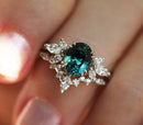 Elegant Oval Emerald Ring Set with oval-cut Emerald and White Diamonds.