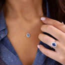 Pendentif or blanc saphir