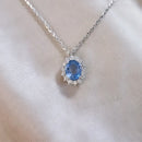 Pendentif or blanc saphir