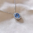 Pendentif or blanc saphir
