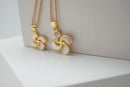 Pendentif en nacre blanche