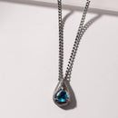 Collier topaze bleue homme argent