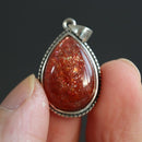 Pierre de soleil pendentif